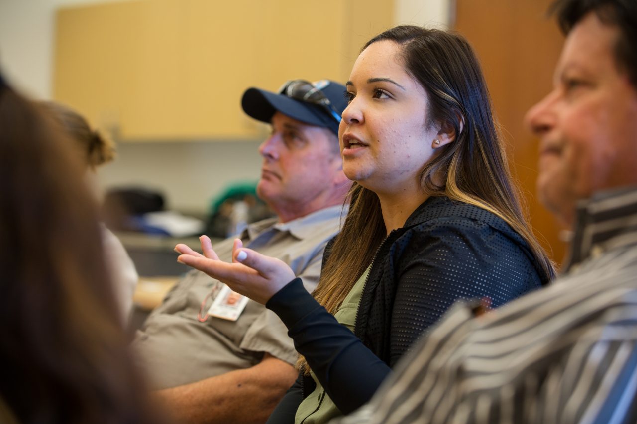 Andrea Mendez speaking at a meeting at San Pablo Community Center to discuss plans for the design of the new San Pablo Public Works Corporation Yard.   Investment in physical infrastructure is an important element in San Pablo's transformation. Andrea Mendez, SP Community Center Recreation Supervisor (center-speaking), John Bothwell (left) and Jeff Blechel (right)